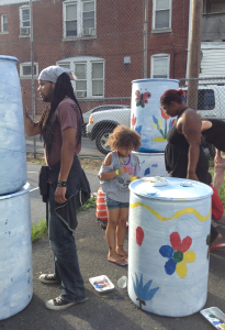Rain-barrel painters at Thursday's Live Healthy Harrisburg health fair.