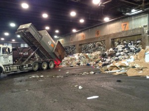 A trash hauler on the tipping floor of the Harrisburg incinerator.