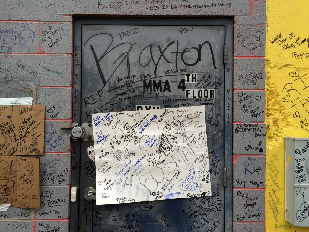 Messages left by friends on the entrance to Braxton Hall, on the 300-block of Carlisle Street.