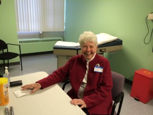 Ruth Stoll in one of the examination rooms at the new Beacon Clinic at 248 Seneca St.
